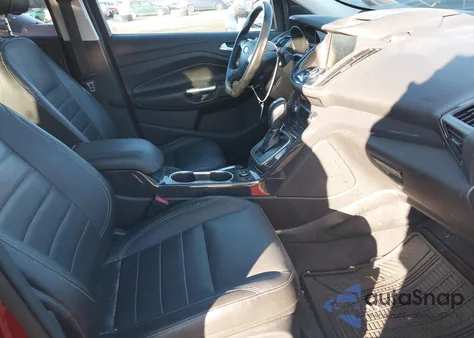 2014 Ford Escape Titanium z USA, uszkodzony, nr VIN 1FMCU9J9XEUA73116